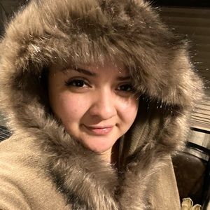 Hooded shawl with faux fur trim